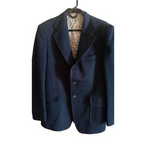 Vintage navy blue knitted two button suit jacket. In good condition.